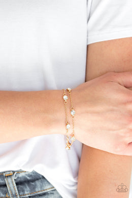 Paparazzi Spotlight Starlight - Gold - White Rhinestones - Adjustable Bracelet - $5 Jewelry with Ashley Swint