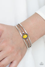 Load image into Gallery viewer, Paparazzi Top Of The Pop Charts - Yellow Cat's Eye Stone - Silver Cuff Bracelet - $5 Jewelry With Ashley Swint