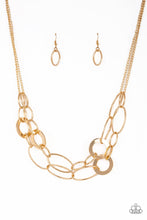 Load image into Gallery viewer, Paparazzi Metallic Maverick - Gold - Rings and Hoops - Bold Layers - Necklace &amp; Earrings - $5 Jewelry With Ashley Swint