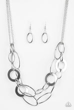 Load image into Gallery viewer, Paparazzi Metallic Maverick - Silver - Rings and Hoops - Bold Layers - Necklace and matching Earrings - $5 Jewelry With Ashley Swint