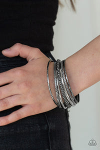 Paparazzi Hit The STACK - Black - Gunmetal Bangles - Set of 7 Bracelets - $5 Jewelry With Ashley Swint