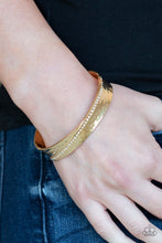 Load image into Gallery viewer, Paparazzi Bring The Bling - Gold - White Rhinestones - Hammered Cuff Bracelet - $5 Jewelry With Ashley Swint
