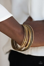 Load image into Gallery viewer, Paparazzi The Big BANGLE - Brass - Set of 7 Bangle Bracelets - $5 Jewelry With Ashley Swint