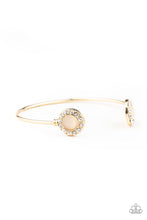 Load image into Gallery viewer, Paparazzi Instant Illumination - Gold - Cat's Eye Moonstone - White Rhinestones - Cuff Bracelet - $5 Jewelry with Ashley Swint