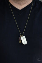 Load image into Gallery viewer, Paparazzi Proud Patriot - Brass - Bullet Pendant - Dog Tags - &quot;Because of the Brave&quot; Necklace - $5 Jewelry with Ashley Swint