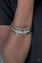 Load image into Gallery viewer, Paparazzi Urban Sprawl - Multi - Gunmetal and Silver Bangles - Set of 9 Bracelets - $5 Jewelry With Ashley Swint