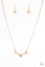 Load image into Gallery viewer, Paparazzi Another Love Story - Gold - Heart Necklace &amp; Earrings - $5 Jewelry with Ashley Swint