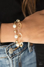 Load image into Gallery viewer, Paparazzi Winner Glimmer - Gold - Bracelet - $5 Jewelry With Ashley Swint