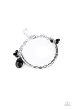Load image into Gallery viewer, Paparazzi Let Yourself GLOW - Black Teardrop Crystal - Hammered Silver Bracelet - $5 Jewelry with Ashley Swint