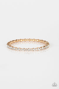 Paparazzi Seven Figure Fabulous - Gold - White Rhinestones Bracelet - $5 Jewelry With Ashley Swint