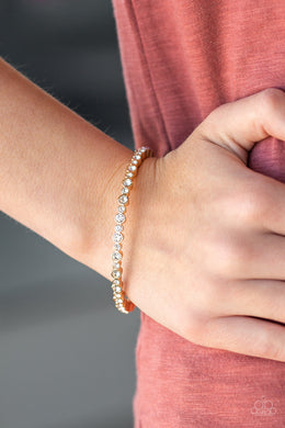 Paparazzi Seven Figure Fabulous - Gold - White Rhinestones Bracelet - $5 Jewelry With Ashley Swint