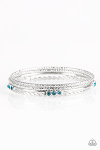 Paparazzi Subtle Shimmer - Blue Rhinestones - Set of 4 Bangle Bracelets - $5 Jewelry With Ashley Swint