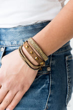 Load image into Gallery viewer, Paparazzi Totally Rockable - Brass - Rhinestones - Double Wrap Snap Bracelet - $5 Jewelry With Ashley Swint