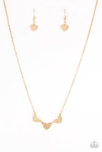 Load image into Gallery viewer, Paparazzi Another Love Story - Gold - Heart Necklace &amp; Earrings - $5 Jewelry with Ashley Swint